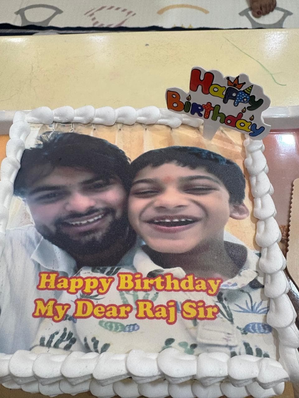 Birthday cake shared between a child and their therapist