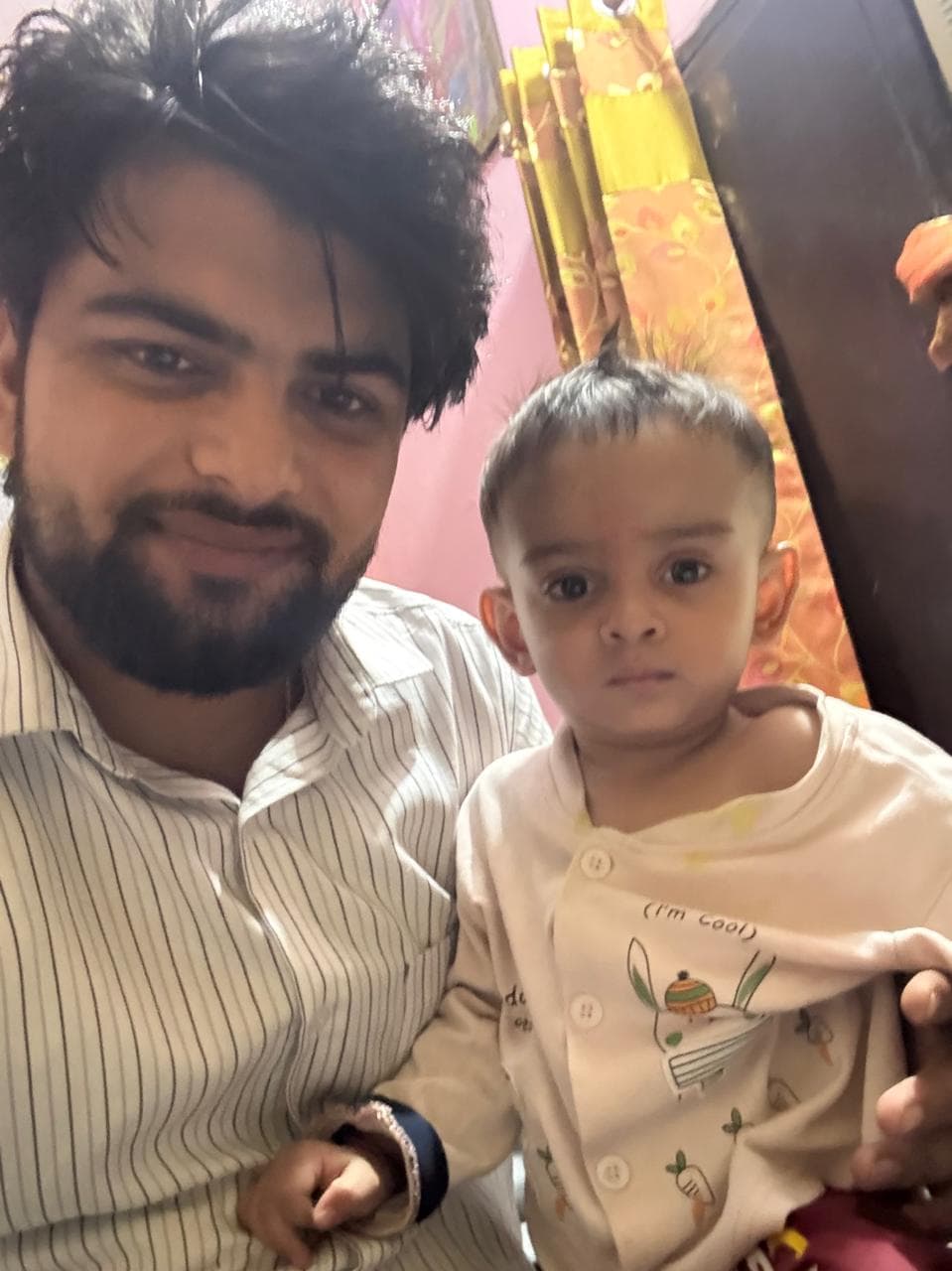 Therapist sitting warmly with a young child
