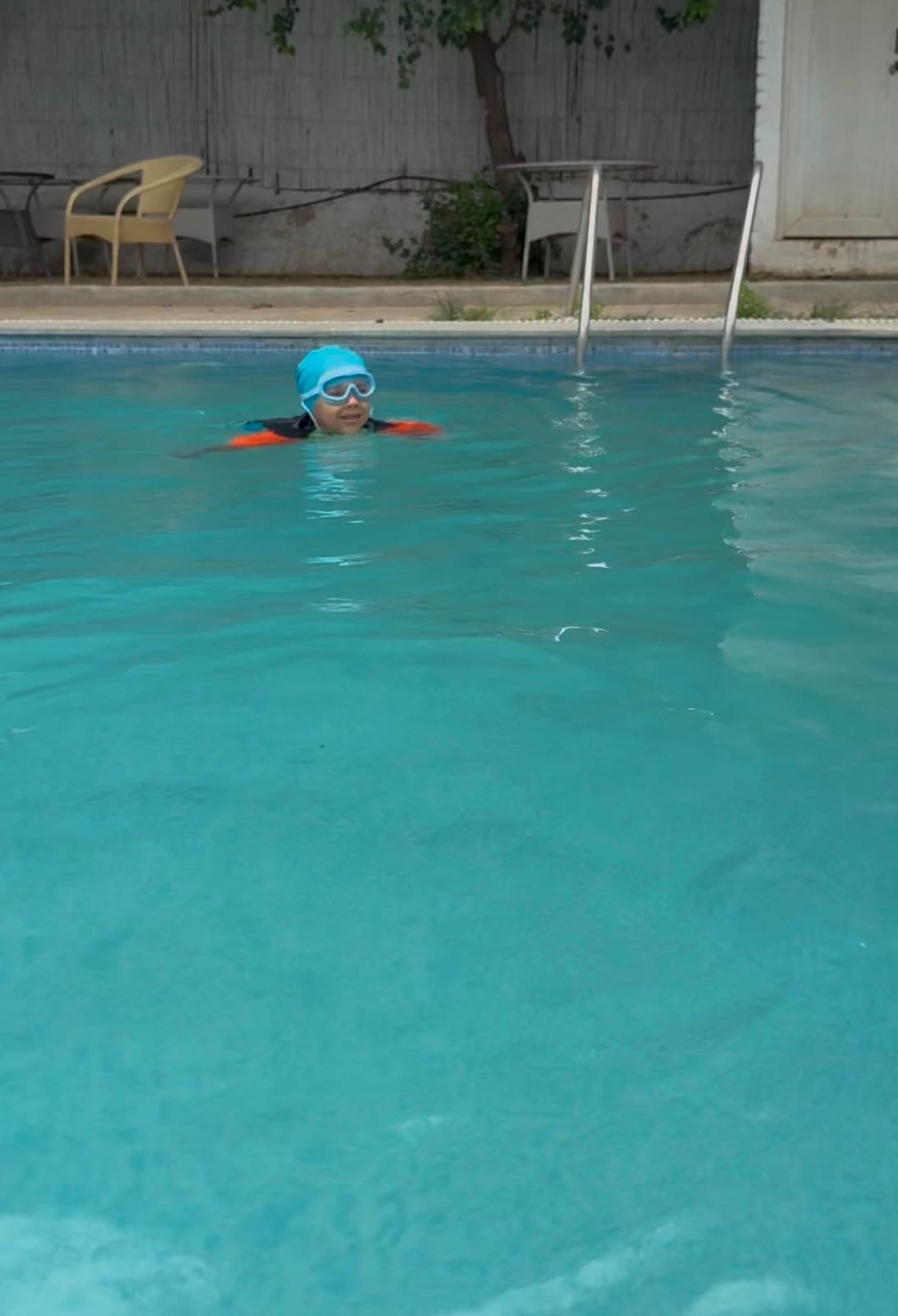 Child swimming during hydrotherapy